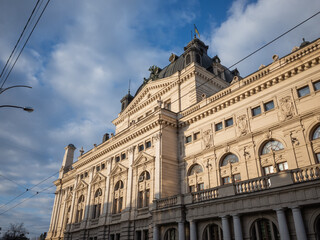 Fototapeta premium exterior of the historical building lightened by evening sunlight in lviv old city