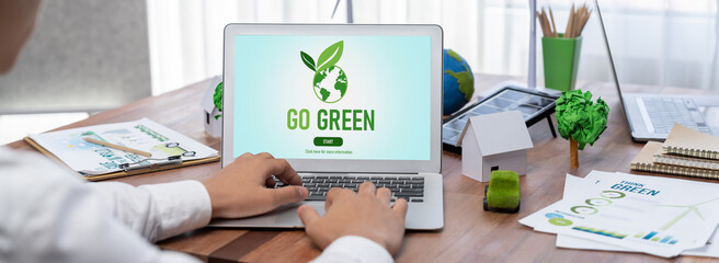 Go green for environmental awareness concept display on laptop on eco-friendly company meeting with...