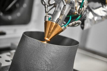 3d printer makes mechanical detail with metal powder in shop