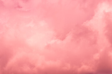 Fantastic surreal bright sky with clouds in red and pink colors
