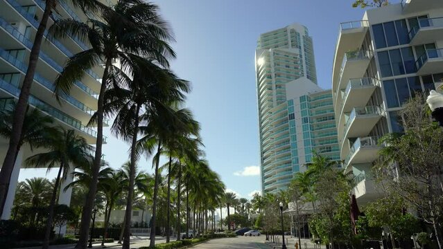 POV driving on Collins Avenue in Miami Beach. Florida road with moving traffic