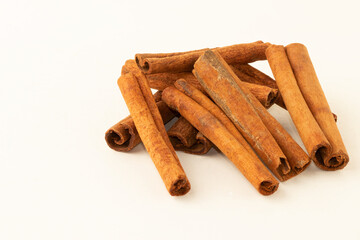 Cinnamon sticks isolated on white background.