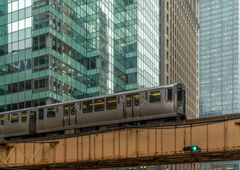 Train on elevated tracks within buildings at the Loop