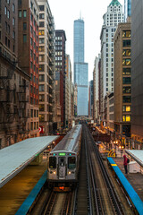 Train on elevated tracks within buildings at the Loop