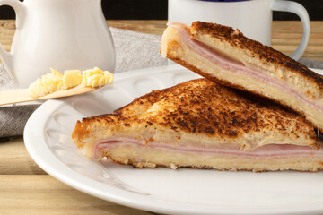 Brazilian toasted bread stuffed with cheese and ham. Selective focus.
