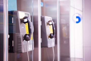 Public phone booths for emergency calls side view
