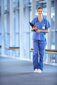 Healthcare, portrait and nurse with a chart at hospital with smile in medicine or cardiology or intern. Female medical, assistant and nursing with paperwork for medicare information at clinic.