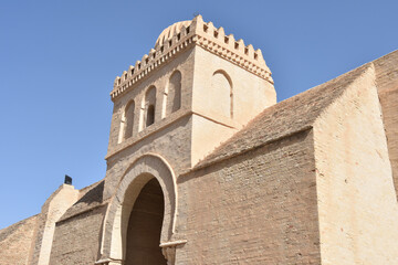 Fototapeta na wymiar Great Mosque of Kairouan Side Entrance, Medium Shot with Keyhole Arch