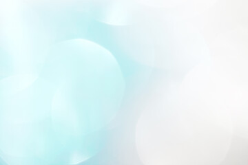 A brilliant blurry white background for a festive mood. Template for greeting card for entertainment.