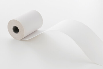 unwound paper roll, copy space, isolated on white background.