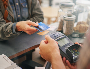 Credit card, debit machine and customer in cafe with hands of cashier for shopping, point of sale...