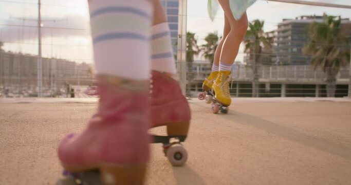 Close up on colourful rollerblades with accessories and decorations. Concept pride and queer joy, self expression through sport and fashion. Fun and female empowerement