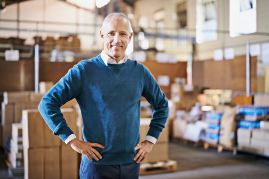 Manager, smile and portrait of man in warehouse for cargo, storage and shipping. Distribution, ecommerce and logistics with employee in factory plant for supply chain, package or wholesale supplier