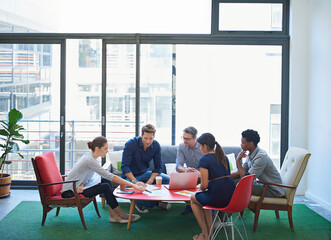 Creative, business people and staff in a meeting, planning and discussion for growth, writing...