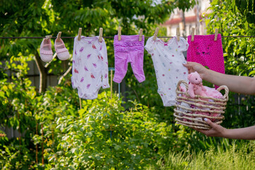 washing baby clothes. Linen dries in the fresh air. Selective focus.