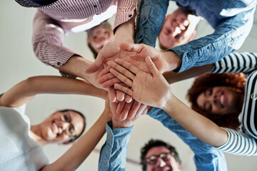 Portrait, business and group with hands together, stack and cooperation with collaboration,...