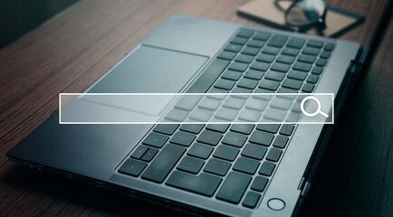 Desktop photo with digital search bar. Internet of things. Concept of searching browsing. Internet...