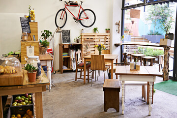 Empty, coffee shop and interior space with table, chairs and furniture or small business, bistro...