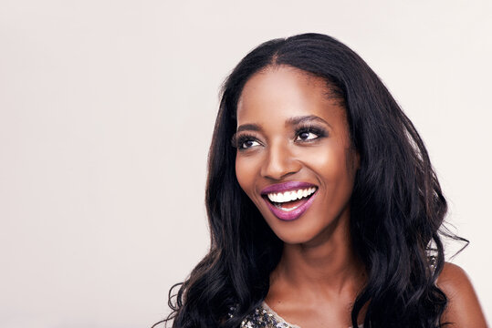 Beauty, thinking and face of black woman in studio for natural makeup, hair extension or idea. Happy female model on a white background for cosmetic mockup space, skin glow and luxury or glamour