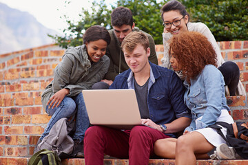 Laptop, university students and group studying, teamwork and planning schedule, project ideas or collaboration. Happy diversity people, youth or friends on college campus steps for online education