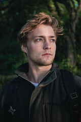 A man out exploring a woodland