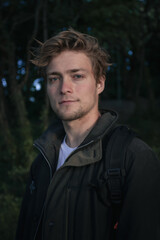 A man out exploring a woodland