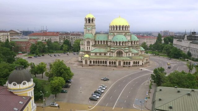 4K Aerial view of capital of Bulgaria, Sofia. Iconic building of the world-famous Sofia. View to cathedral St. Alexander Nevsky, the largest church in the Balkans. Roofs of buildings, streets and park