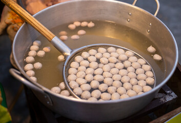 The meatballs are boiled to be ready.