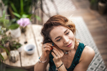 Fototapeta premium Attractive woman sitting pensively and lonely close up and copy space. Selective focus