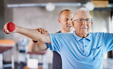 Physiotherapist, senior man and weight training for health and wellness therapy in retirement....