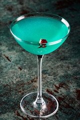 alcoholic cocktail in a glass stands on a table in a bar or restaurant