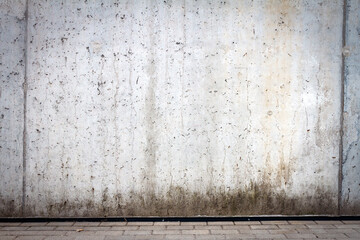 Concrete wall and parking place