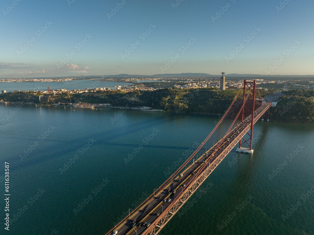 Sticker the 25 april bridge (ponte 25 de abril) located in lisbon, portugal, crossing the targus river. dron