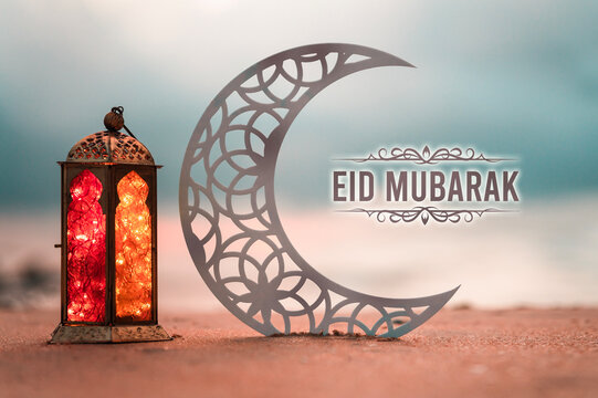 Crescent moon with lantern lamp in the beach, Eid Mubarak greeting poster image
