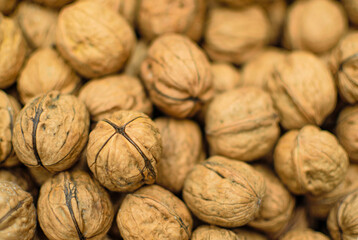 Image of walnuts stocked in market for consumption.