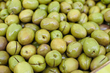 Image of olives stocked in market for consumption.
