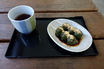 Japanese traditional dessert  matcha dango wagashi sweet dumpling and tea