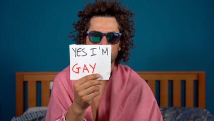 A 40-year-old man says  yes, I am gay - Outing o coming out concept - LGBT free people - 
gay pride and defense of the rights of the homosexual and bisexual community