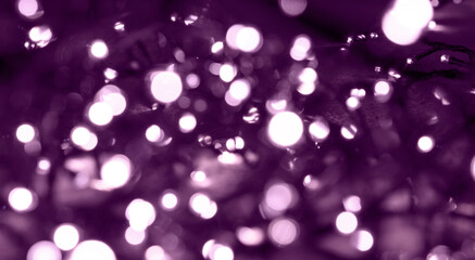 Generic purple fairy light twinkly background texture.