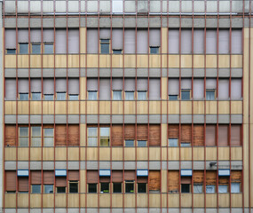 A frontal photo of a modern facade in the city of Arezzo
