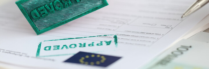 EU Schengen visa application and stamp approved document. Positive application for entry into European Union