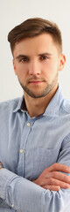 Portrait of handsome young attentive focused businessman in shirt. Business consultant manager or boss concept