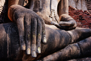 Close-up of Buddha's hand, ancient sculpture