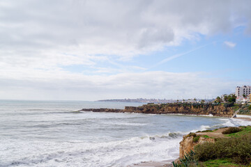 Beautiful view of ocean beach, Lisbon Portugal.