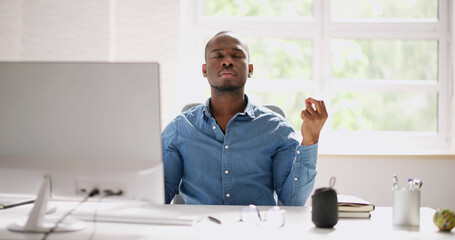 African Employee Doing Mental Health Yoga Meditation