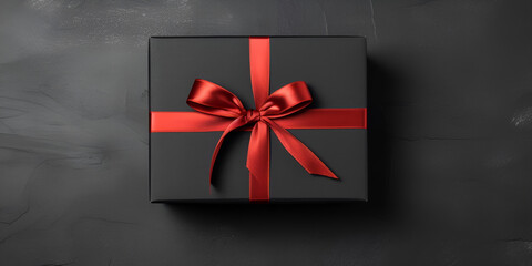 "Minimalistic Black Gift Box with Red Bow: Top View, White Background"