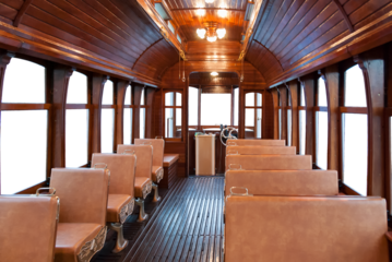 Interior of old restored wooden Portuguese wooden tram. Porto, Portugal. Cutout with transparent background.