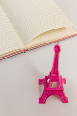 a book and a eiffel tower