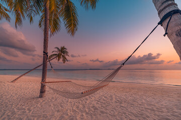 Romantic beautiful tropical Maldives beach landscape. Colorful dreamy sea sky swing or hammock on coconut palm trees. Luxury vacation, destination honeymoon concept. Exotic travel, relax peace seaside