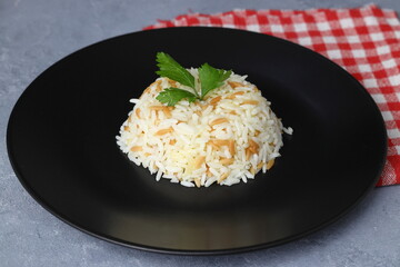 Traditional Turkish Rice Pilav. Plain Pilaf Portion Served. Organic Food. Turkish style rice pilaf (Turkish name, sehriyeli pirinc pilavi)